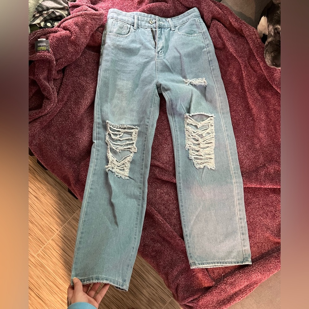 Distressed Light Blue Jeans